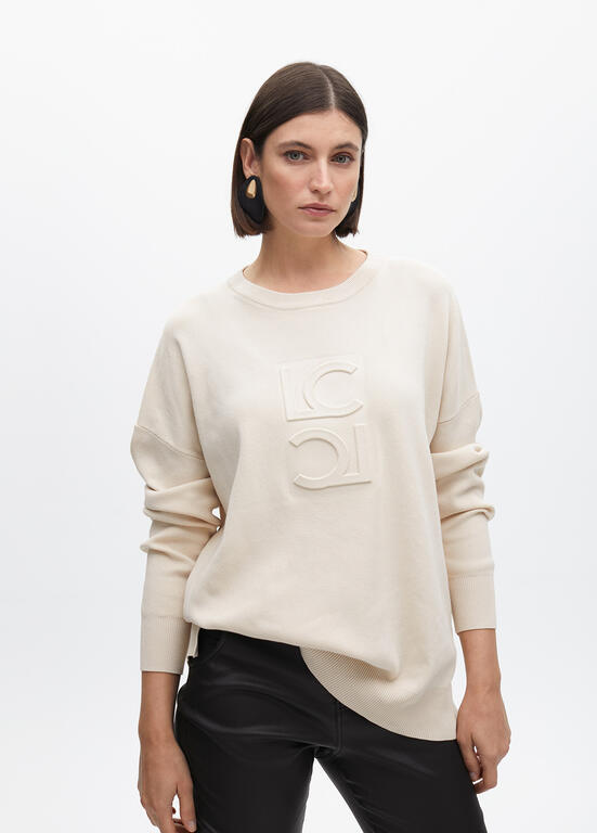 Round neck sweater with raised logo detail