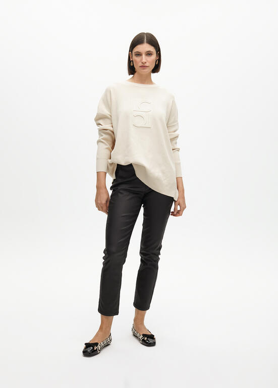 Round neck sweater with raised logo detail